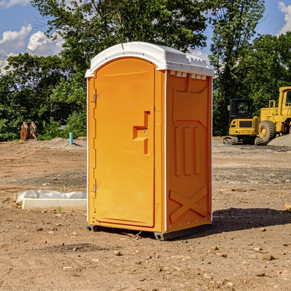 how often are the portable toilets cleaned and serviced during a rental period in New Denmark